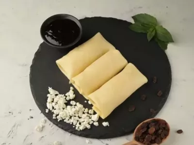 Млинці з Родзинками та Сиром